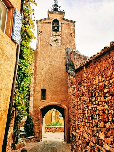 The Pinky-Orange buildings and narrow streets of Roussillion village