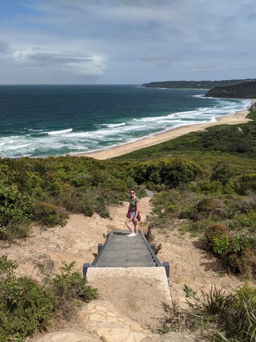 Steps lead from the woods to the beach in Glenrock Conservation area in Newcastle, New South Wales, Australia