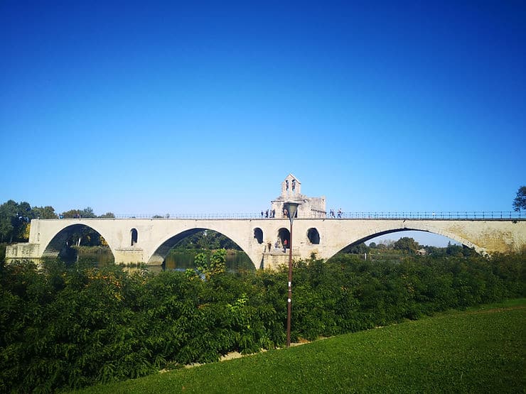 The famous Pont d'Avignon only stretches halfway across the Rhone river in Avignon, Provence