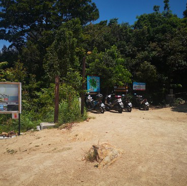 Parking for the Bottle beach hiking trail in Koh Phangan, Thailand