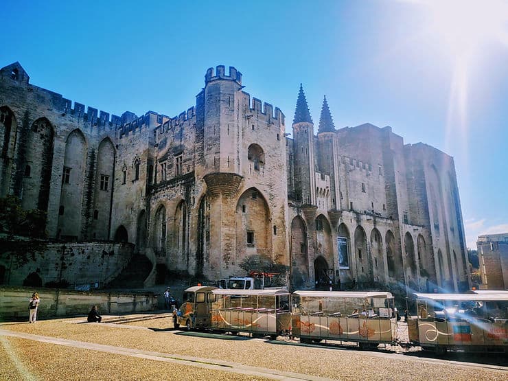 The Avignon tourist train outside the Impressive Palais des Papes