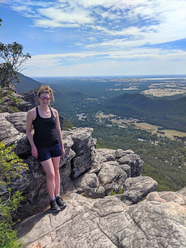 Standing on the cliff edge of the Pinnacle Lookout, with miles and mile of lush green valley and tiny villages spreading out below