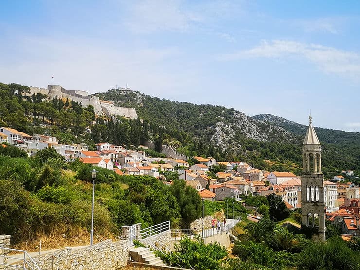 Standing above the Veneranda Fortress with views of St Stephen's bell tower and the Spanish Fortress in Hvar Town