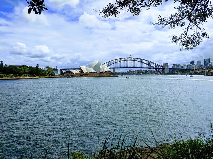 View of Sydney Opera House and Sydney Harbour Bridge in Australia from Mrs Macquarie