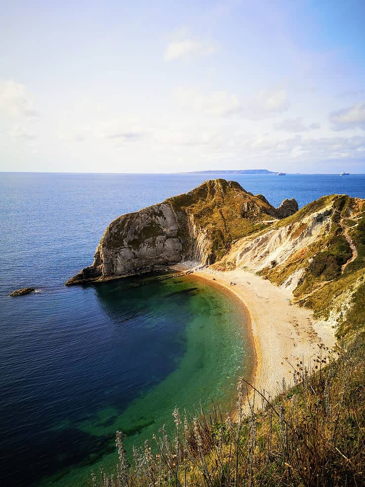 The sweeping beach and cliffs of Man O War beach in Dorset