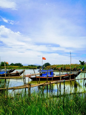 Fishing boats moored at Cam Kim Island in Hoi An, Vietnam