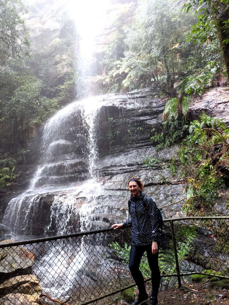 Standing in the rain at Katoomba falls in the Blue Mountains, NSW, Australia 