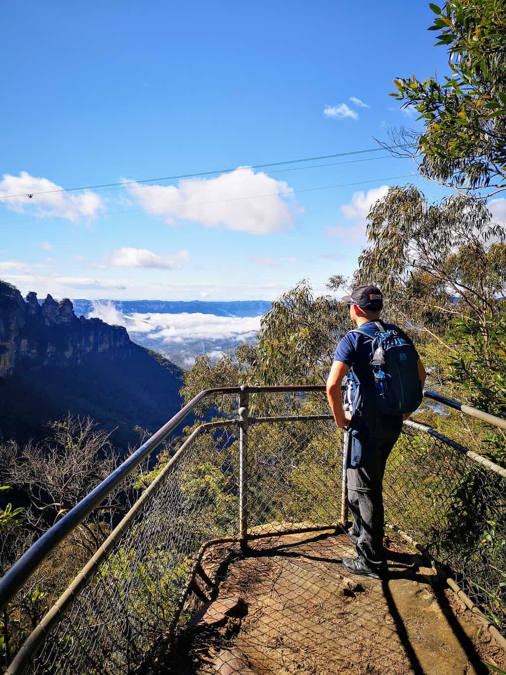 Admiring the Blue Mountains and valley on a clear day with blue skies from Furber lookout Viewpoint 