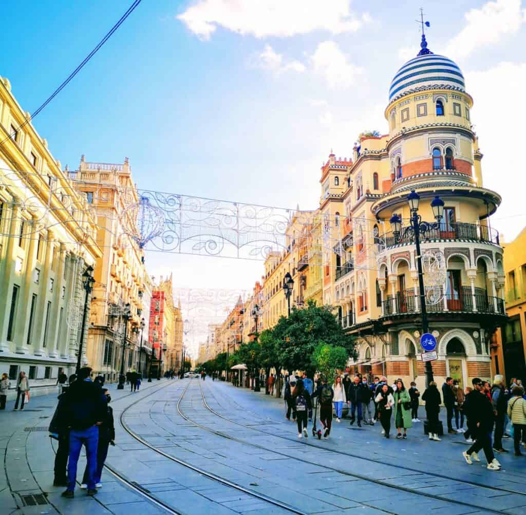 Avenue Constitution in Seville - the main street in the centre of Seville is lined with impressive buildings and cafes